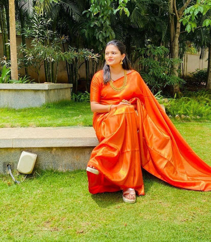 Vibrant Orange Soft Silk Saree with Elegant Minimal Finish